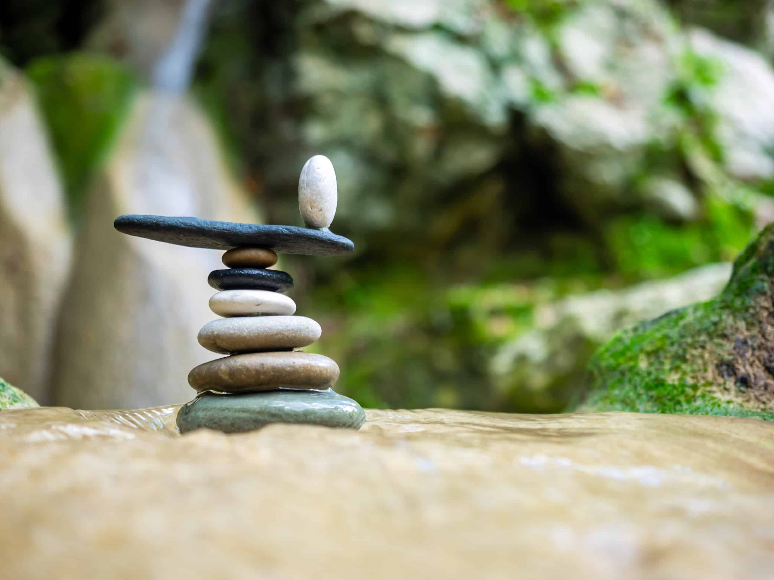 Balanced Zen stones pebbles at the waterfalls